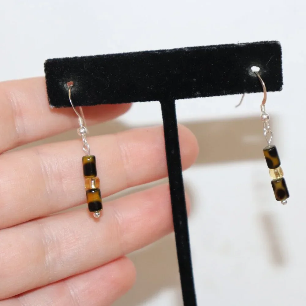 Beautiful NWOT Silver, animal print and yellow dangle earrings 1.5